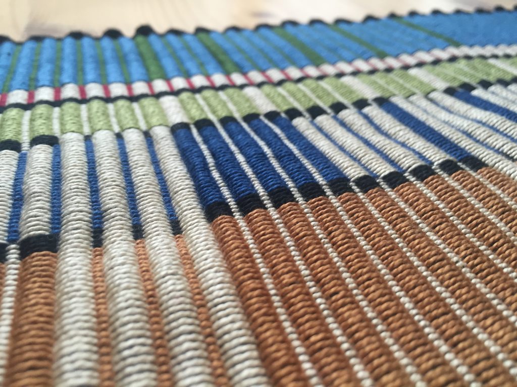 Detail of Prairie Style/Frank Lloyd Wright-inspired rep weave rug